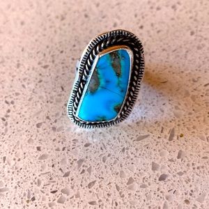 Sterling silver Navajo style turquoise ring.